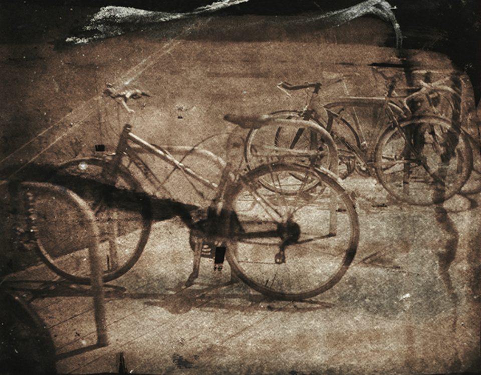 Bicycles on the street, salted paper print