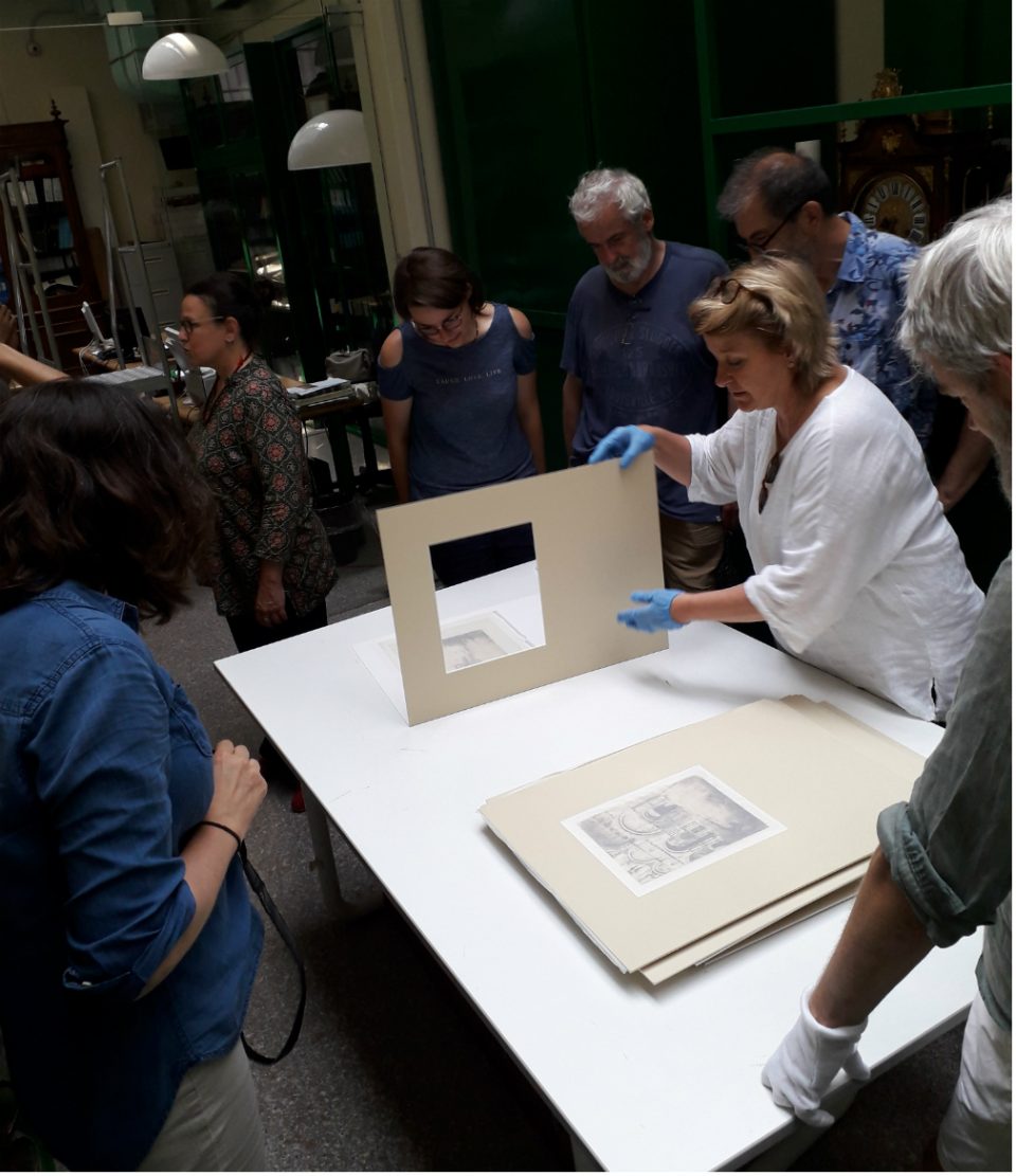 Professor of the Accademia di Belle Arti di Brera Chiara Palandri showing to the members of The Calotype Society archive of XIX century photographer Luigi Sacchi