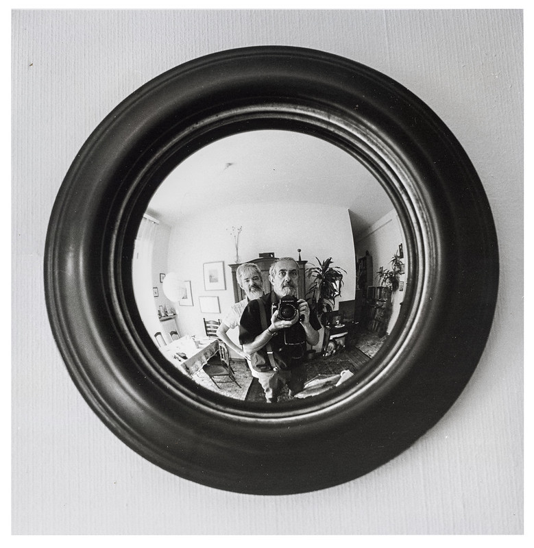 round convex mirror, men, camera, Giorgio Bordin, Claudio Santambrogio